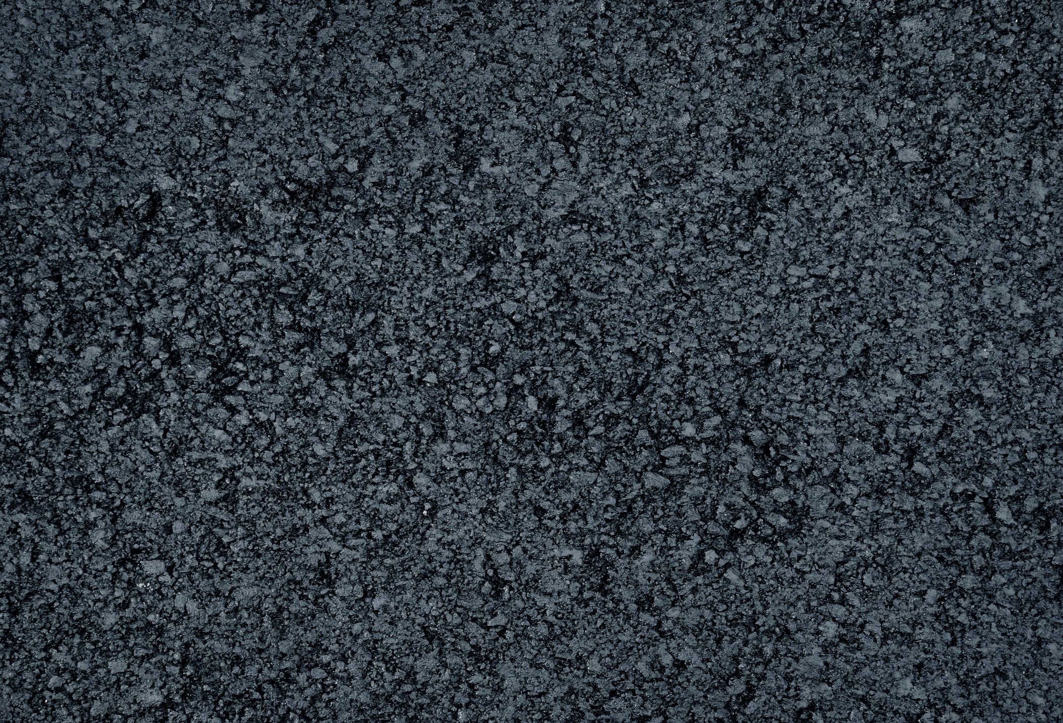 Asphalt pavement texture used for residential driveway paving.