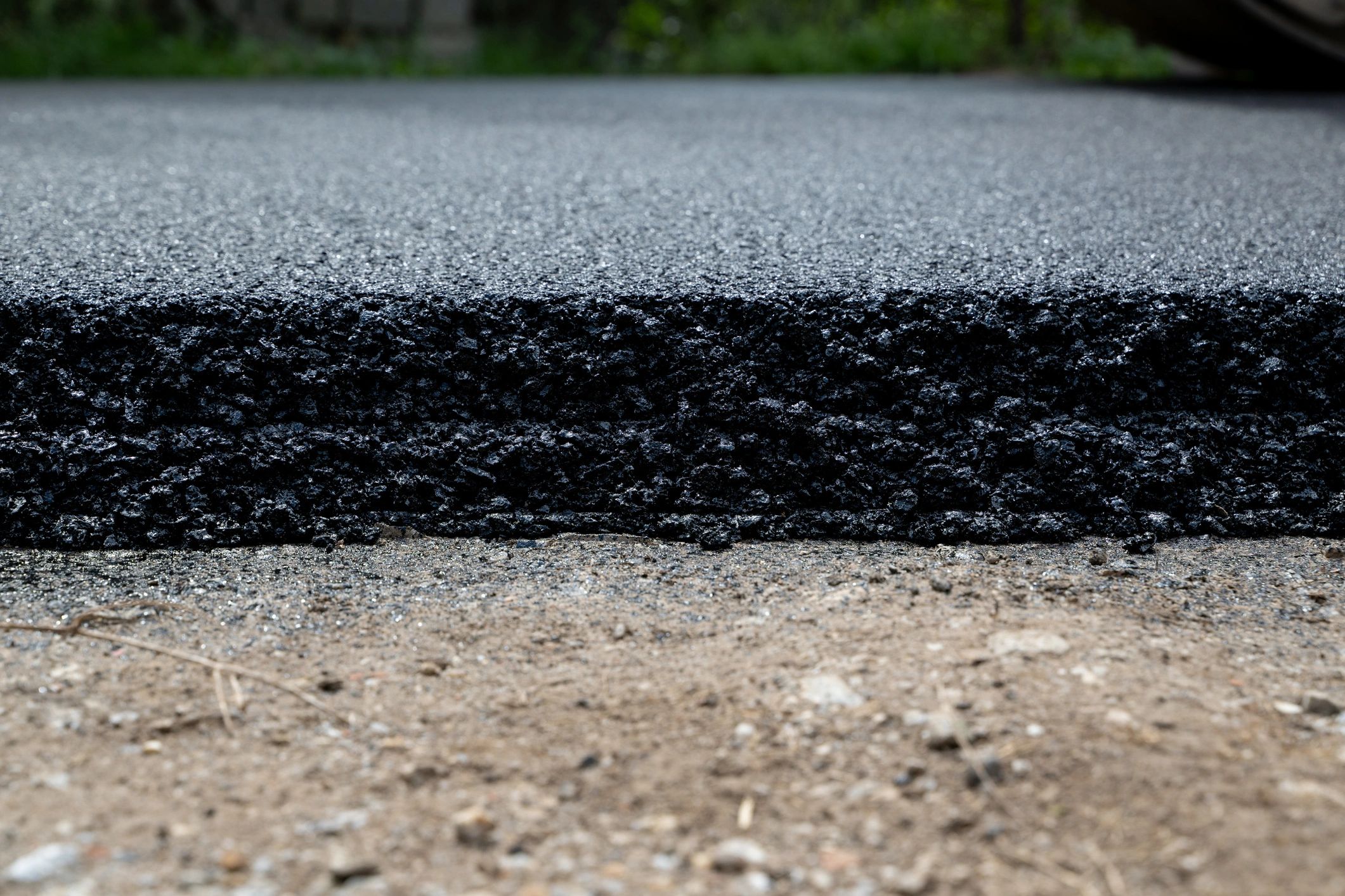 Grading stone base for commercial parking lot asphalt paving